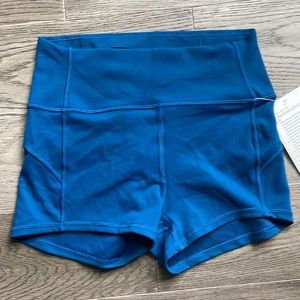 Teal Lululemon In-Movement 2.5” shorts, never worn with original tags